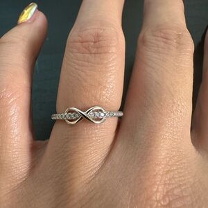 Elegant Silver Infinity Moissanite Ring